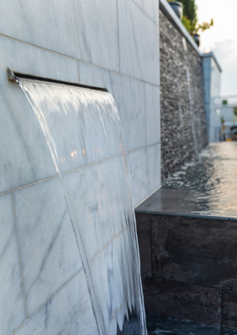 freeze waterfall backyard pool in Dallas